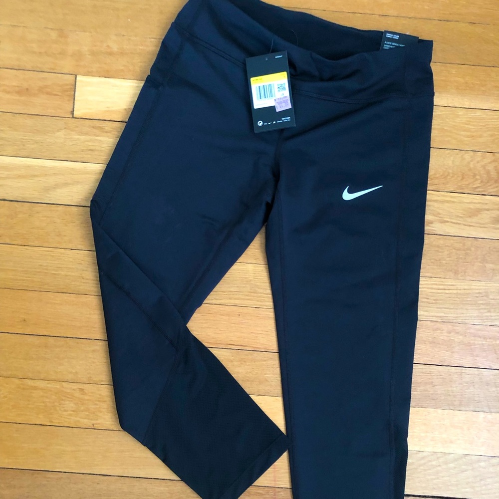 Nike running crops size S never worn.
